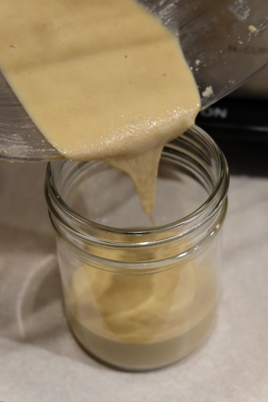 Pour the tahini you made into a glass jar.
