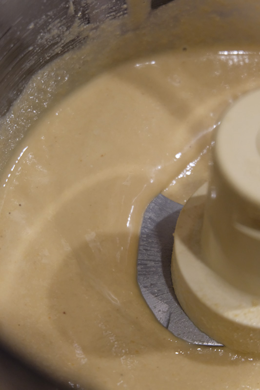 After processing for about 2 minutes more, it finally looks shiny and liquid-y. Your tahini is done!
