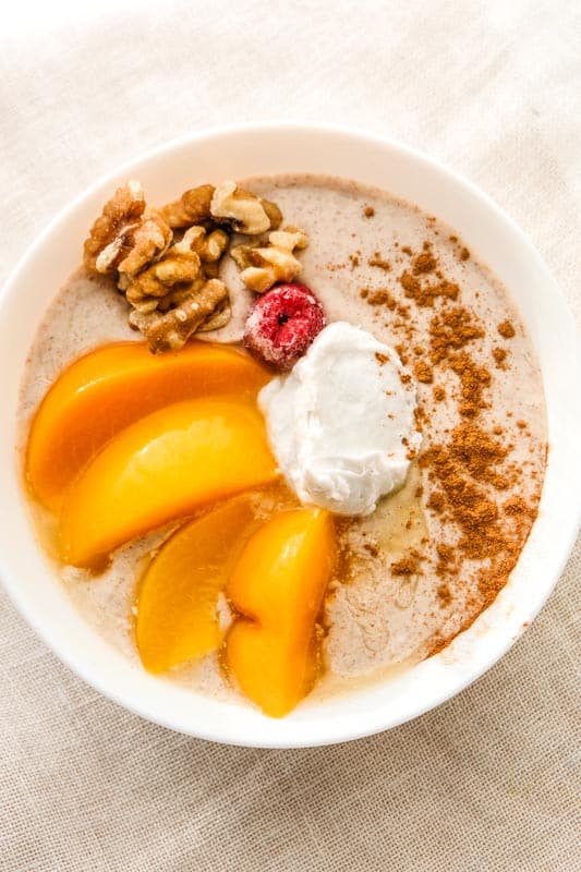 https://instantveg.com/wp-content/uploads/2020/04/Vegan-Smoothie-Bowl-Peaches-Cream-Walnut-Raspberry-Coconut-Cinnamon-Flax-5.jpg